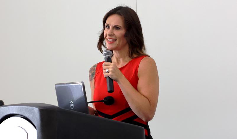 Stefanie Munsterman speaking at a women in leadership meeting at mount mercy university grad center